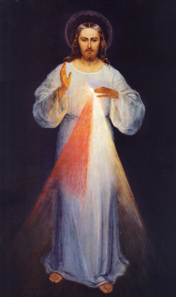 The Divine Mercy image of the risen Jesus with red and pale rays shining from His heart.