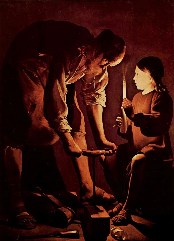 Saint Joseph working by candlelight with the boy Jesus.