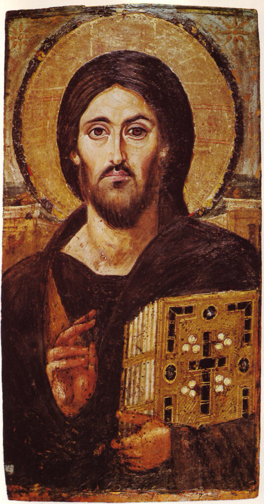 Ancient Byzantine icon of Christ Pantocrator blessing.